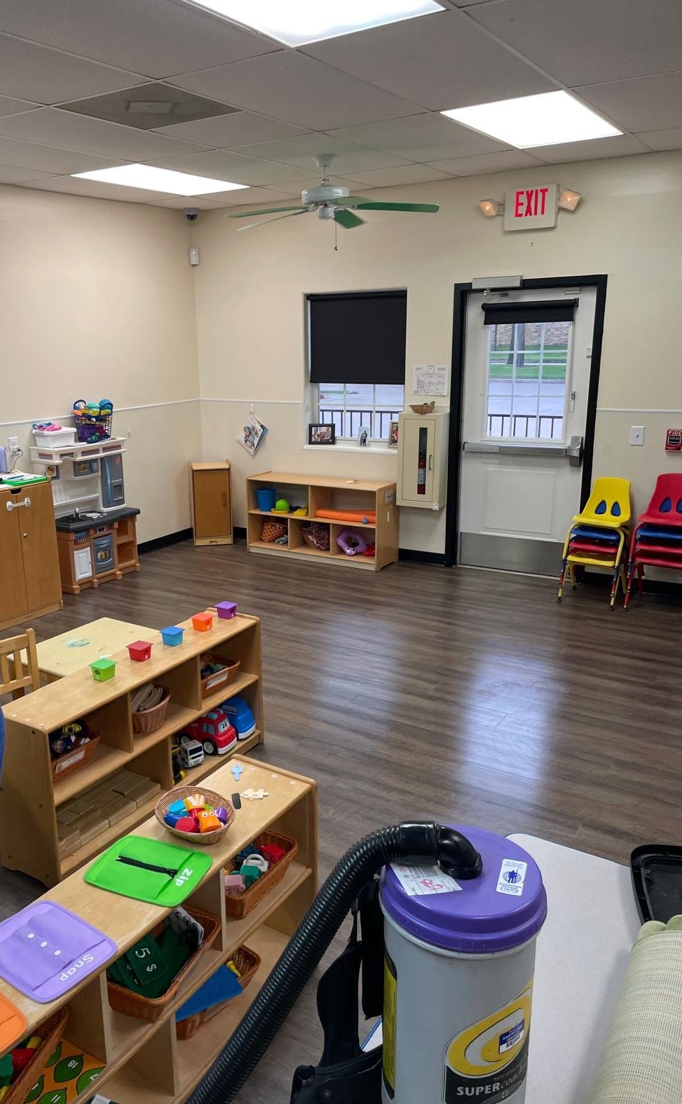 Spotless kitchen with gleaming countertops and stainless steel appliances after deep cleaning